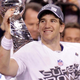 Illustration for article titled Eli Manning: Stop Wearing T-Shirts Over Your Shoulder Pads